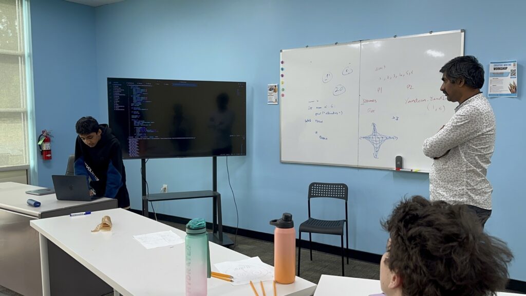 Students participating in Python summer camp activities at Y2L Academy.